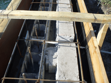 Steel reinforcement with concrete cap