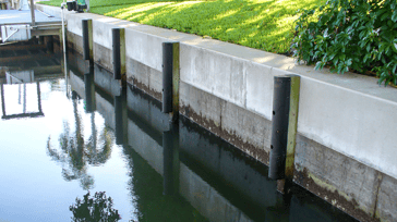 Concrete wall with concrete cap with flexmaster bumpers