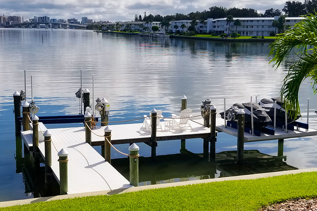 Dock with White Piling Caps and Rope Handrail